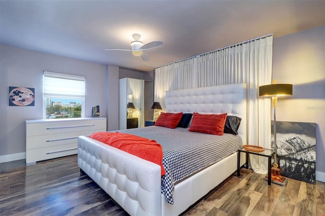 bedroom featuring hardwood / wood-style flooring and ceiling fan