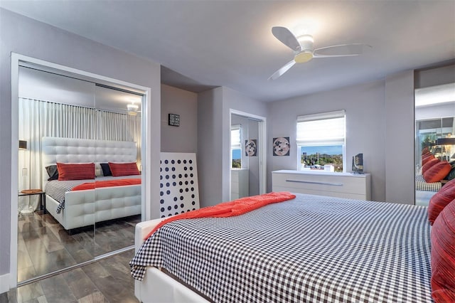 bedroom with ceiling fan and a closet