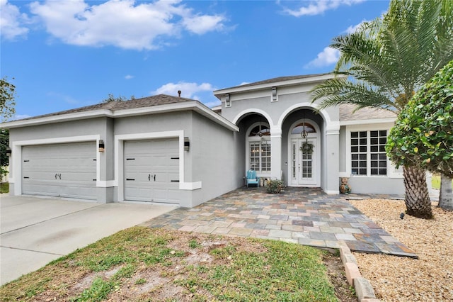 ranch-style house featuring a garage