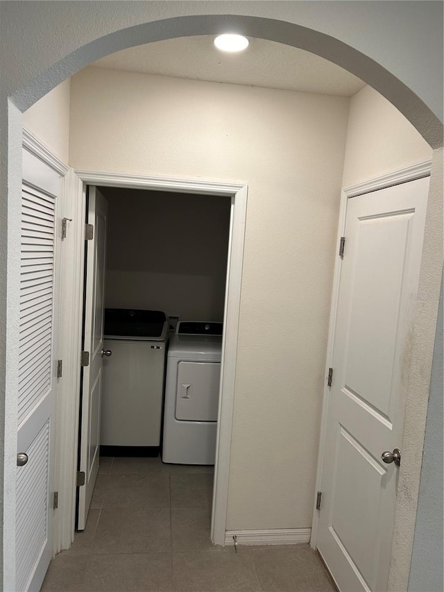 laundry area with washing machine and dryer