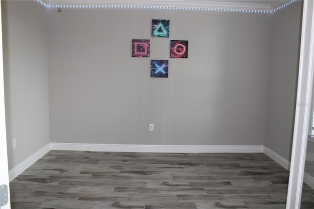 unfurnished room with hardwood / wood-style floors