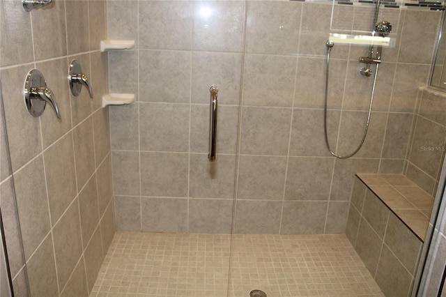 bathroom featuring an enclosed shower