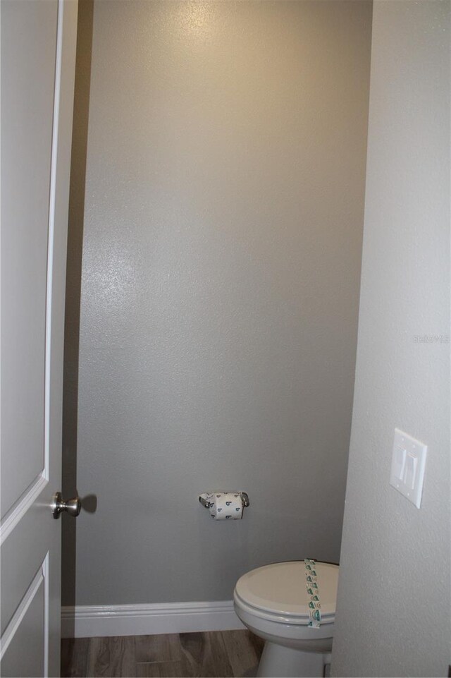 bathroom featuring toilet