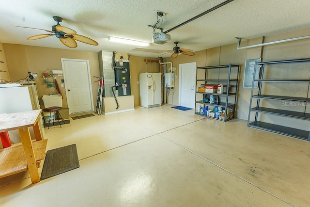 1604 Boswell Ln, New Port Richey, FL 34655 - garage featuring white refrigerator with ice dispenser, ceiling fan, heating unit, a garage door opener, and water heater