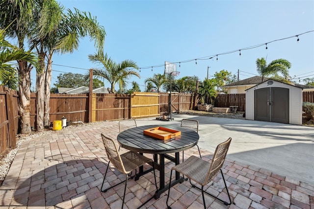 view of patio / terrace with a shed