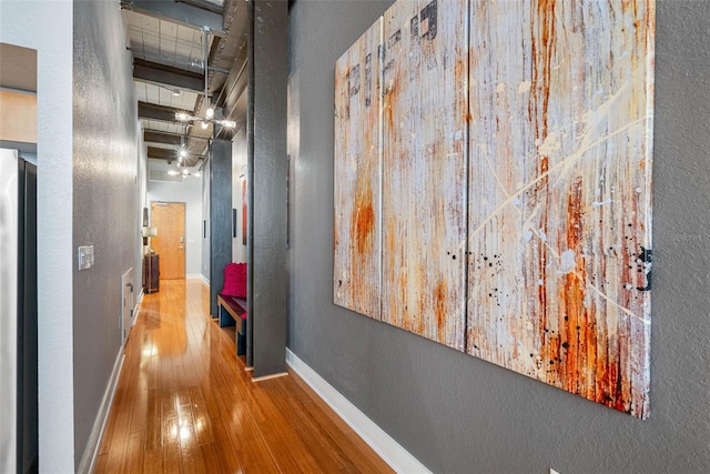 corridor featuring hardwood / wood-style flooring