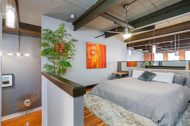 bedroom with beam ceiling, ceiling fan, wood ceiling, and wood-type flooring