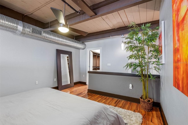 bedroom with ceiling fan and light hardwood / wood-style flooring