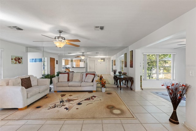 living room with light tile patterned flooring