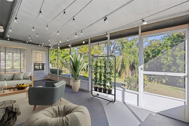 sunroom / solarium with rail lighting