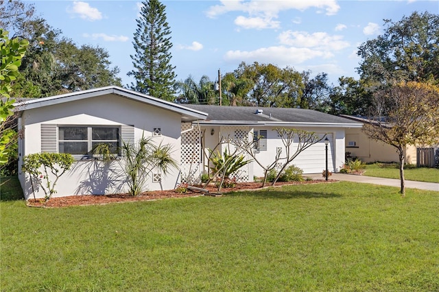 ranch-style house with a garage and a front yard