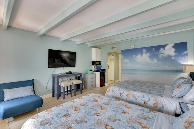 tiled bedroom featuring beam ceiling