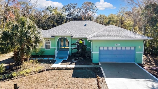 view of front of house with a garage