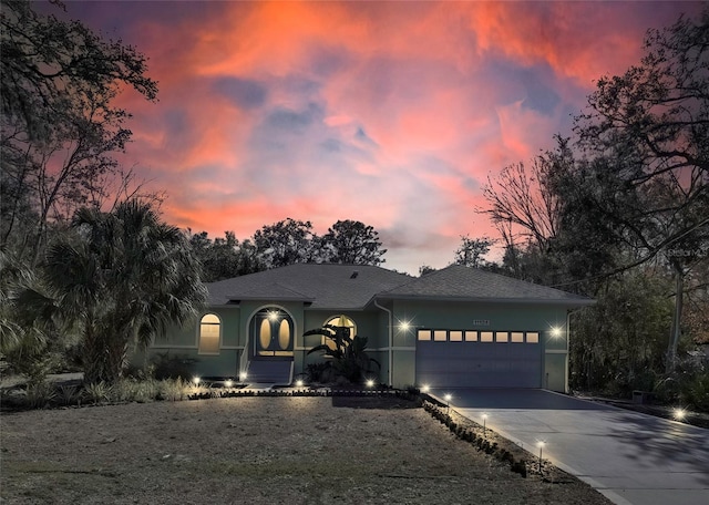 view of front of property featuring a garage