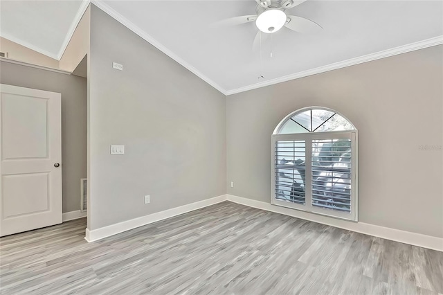 empty room featuring ceiling fan, crown molding, and light hardwood / wood-style floors