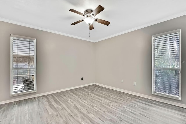 unfurnished room featuring ceiling fan, ornamental molding, and light hardwood / wood-style flooring