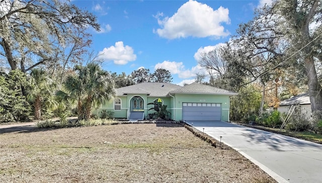 ranch-style home with a garage