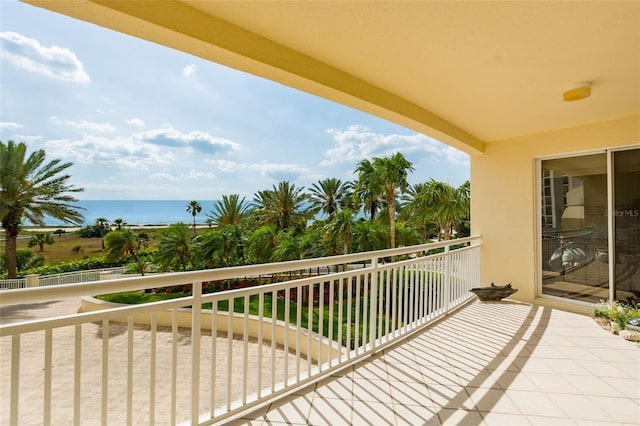 balcony featuring a water view