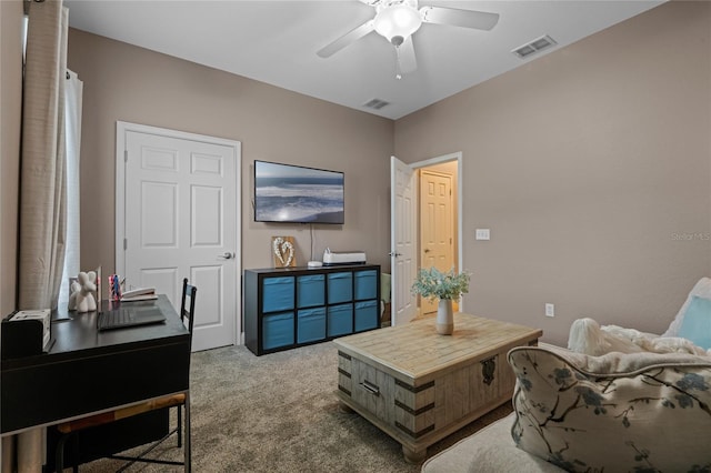 living room with light colored carpet and ceiling fan