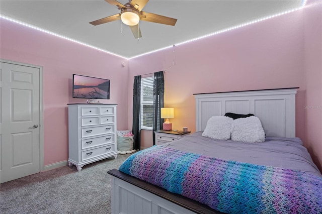 carpeted bedroom featuring ceiling fan