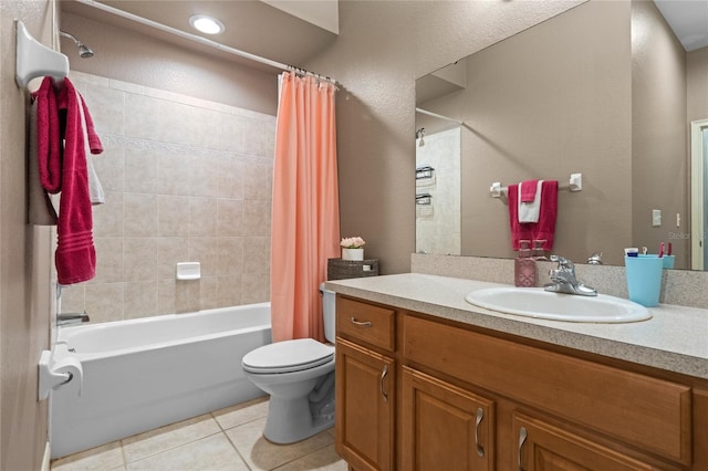 full bathroom with toilet, vanity, tile patterned floors, and shower / bathtub combination with curtain