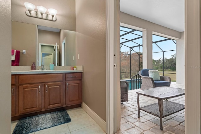 bathroom with tile patterned floors and vanity