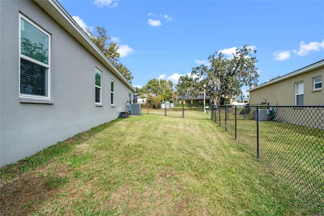 view of yard with central AC unit