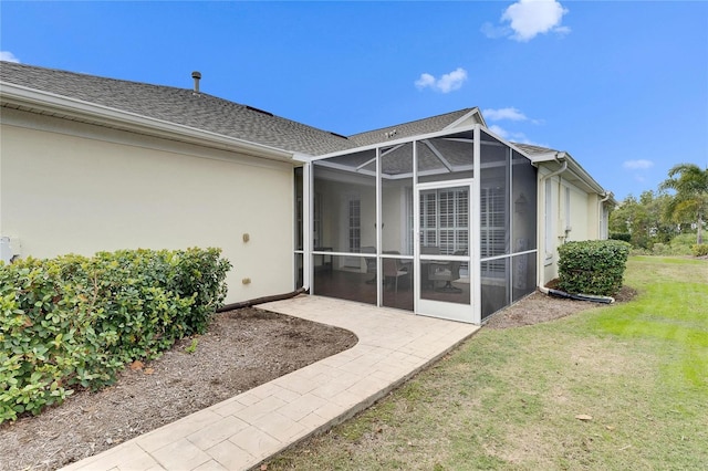 exterior space featuring a yard and a patio