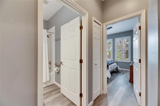 hall featuring light wood-type flooring