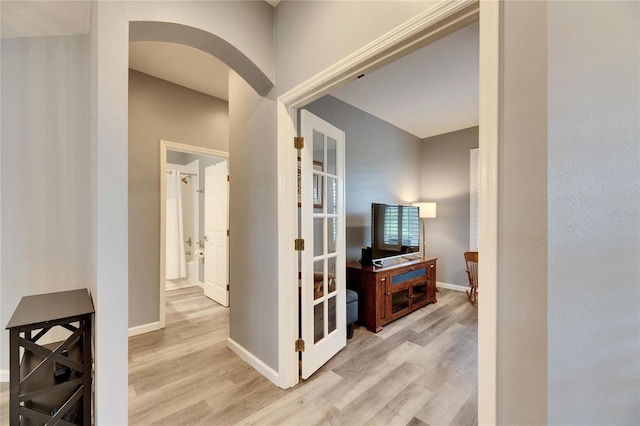 hallway featuring light hardwood / wood-style floors