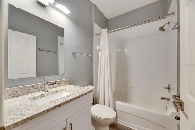 full bathroom with toilet, vanity, and shower / bathtub combination with curtain