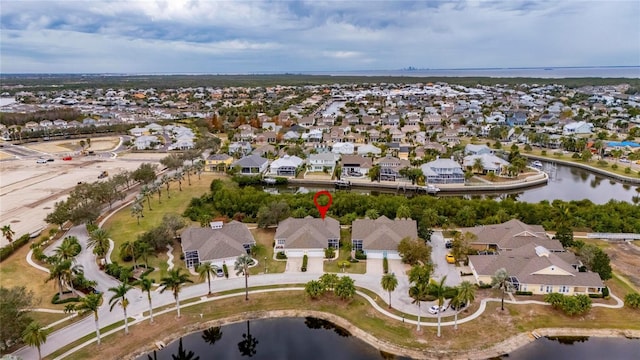 aerial view featuring a water view