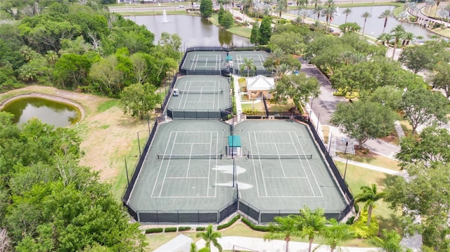 birds eye view of property featuring a water view