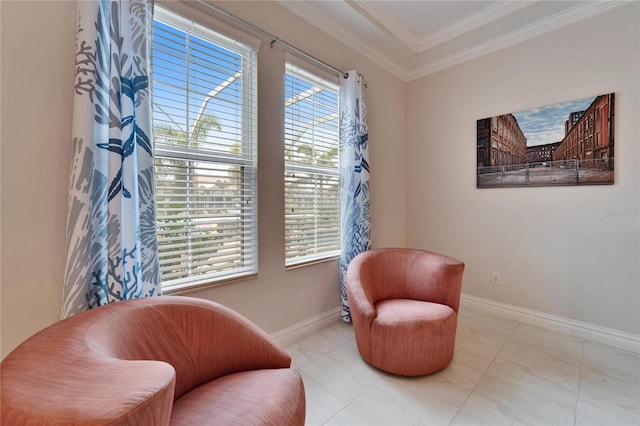 living area featuring crown molding