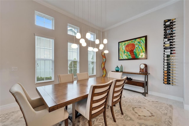 dining area featuring crown molding