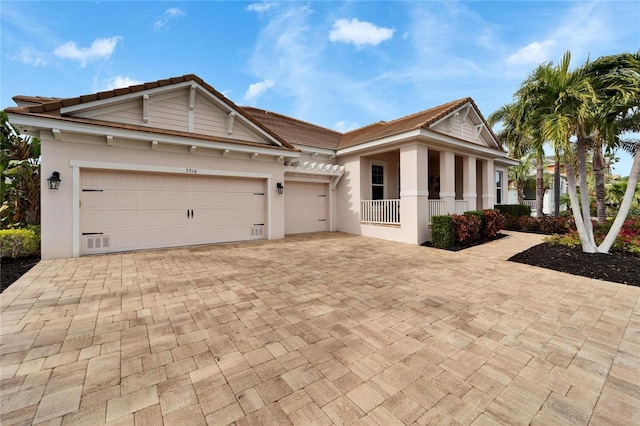 view of front of home with a garage