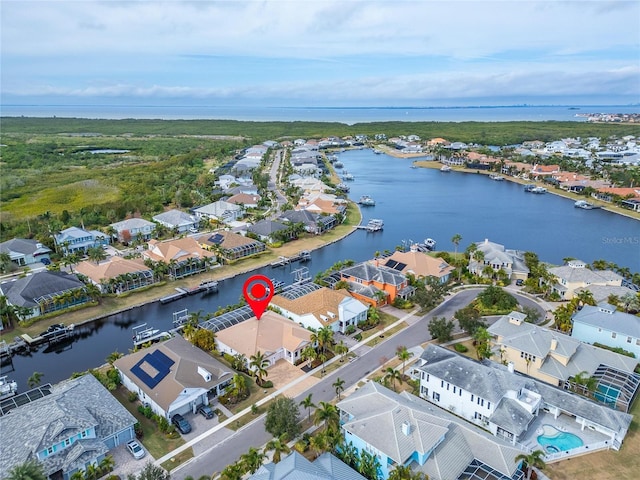 bird's eye view with a water view