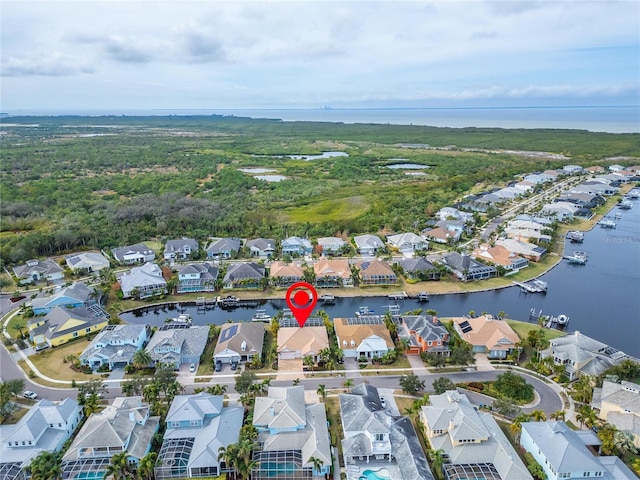 drone / aerial view with a water view