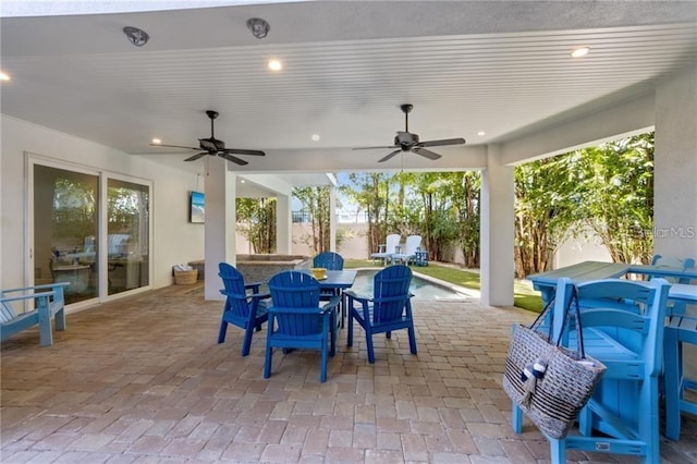 view of patio with ceiling fan