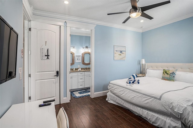 bedroom featuring ornamental molding, dark hardwood / wood-style floors, a textured ceiling, and ensuite bath