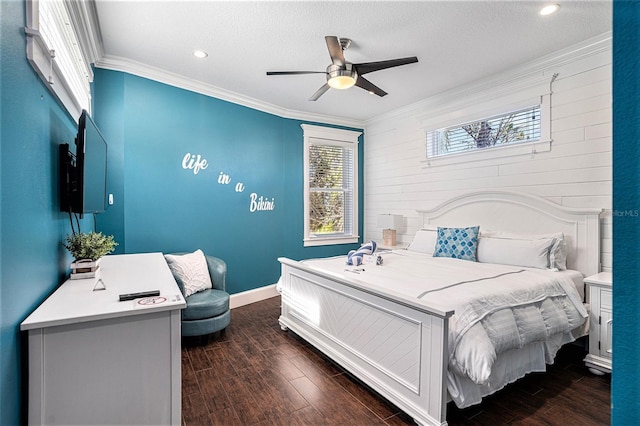 bedroom with crown molding, ceiling fan, dark hardwood / wood-style flooring, and a textured ceiling