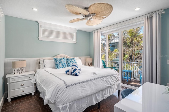 bedroom with access to outside and ceiling fan