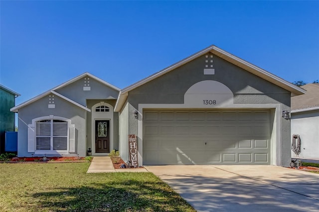 ranch-style house featuring a garage and a front lawn