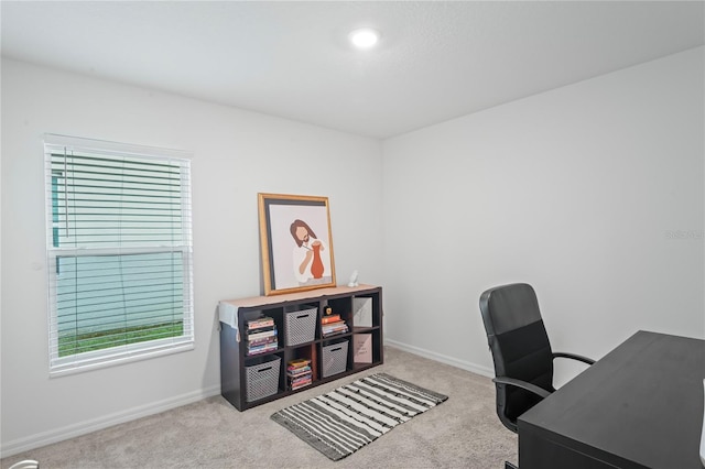 home office featuring light colored carpet