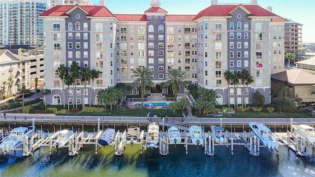 view of building exterior featuring a water view