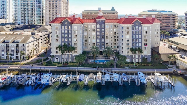 birds eye view of property featuring a water view