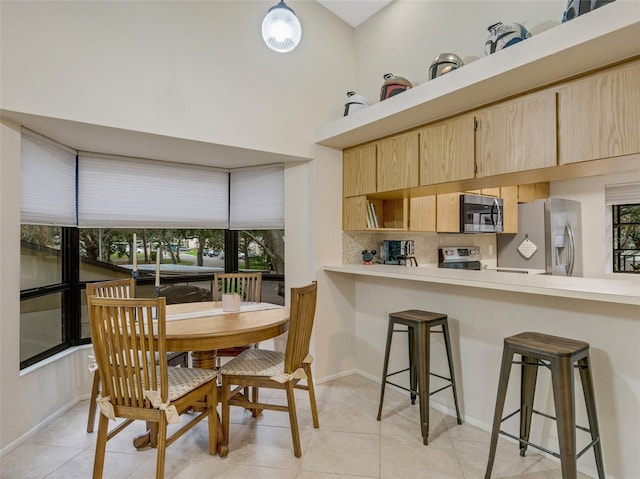 view of tiled dining space