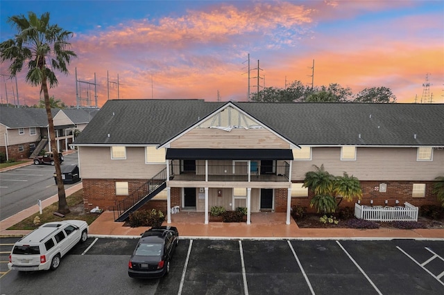 view of outdoor building at dusk