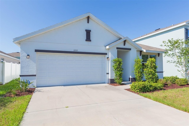 single story home featuring a garage