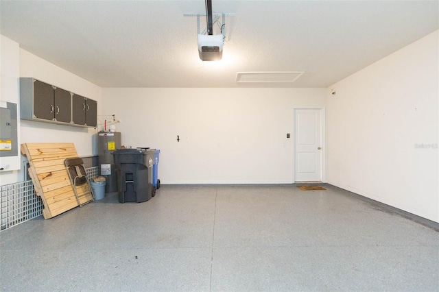 garage with water heater and a garage door opener